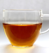Organic Earl Grey Tea in clear glass teacup