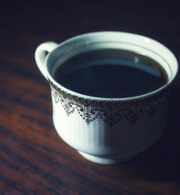 black coffee in a porcelain coffee cup