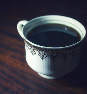 black coffee in a porcelain coffee cup