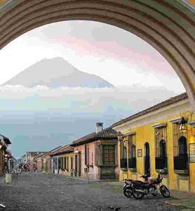 guatemala antigua sits in shadow of Volcán de Fuego