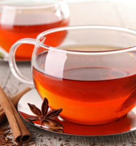 Cinnamon Plum Herbal in two clear glass teacups