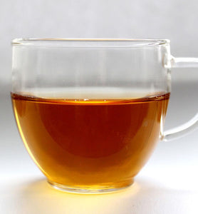 Organic Earl Grey Tea in clear glass teacup