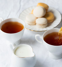 Organic English Breakfast Tea in two white porcelain teacups
