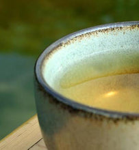 green tea in jade-colored teacup