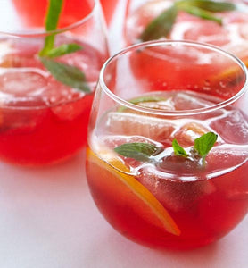 iced raspberry green tea in clear glasses